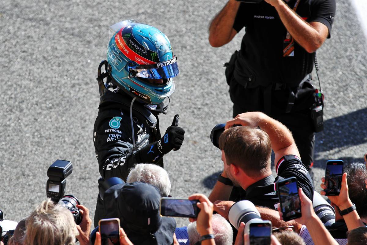 George Russell (GBR) Mercedes AMG F1 celebrates his third position in parc ferme. 11.09.2022. Formula 1 World Championship, Rd 16, Italian Grand Prix, Monza, Italy, Race