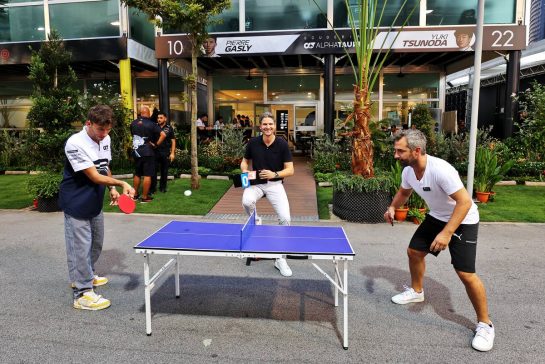 (L to R): Pierre Gasly (FRA) AlphaTauri plays table tennis with Timo Glock (GER) in the paddock.
29.09.2022. Formula 1 World Championship, Rd 17, Singapore Grand Prix, Marina Bay Street Circuit, Singapore, Preparation Day.
- www.xpbimages.com, EMail: requests@xpbimages.com &copy; Copyright: Moy / XPB Images