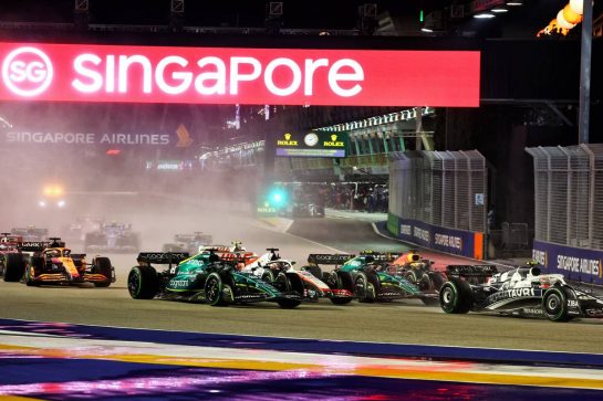 Lance Stroll (CDN) Aston Martin F1 Team AMR22; Kevin Magnussen (DEN) Haas VF-22; Sebastian Vettel (GER) Aston Martin F1 Team AMR22; and Max Verstappen (NLD) Red Bull Racing RB18 at the start of the race.
02.10.2022. Formula 1 World Championship, Rd 17, Singapore Grand Prix, Marina Bay Street Circuit, Singapore, Race Day.
- www.xpbimages.com, EMail: requests@xpbimages.com &copy; Copyright: Batchelor / XPB Images