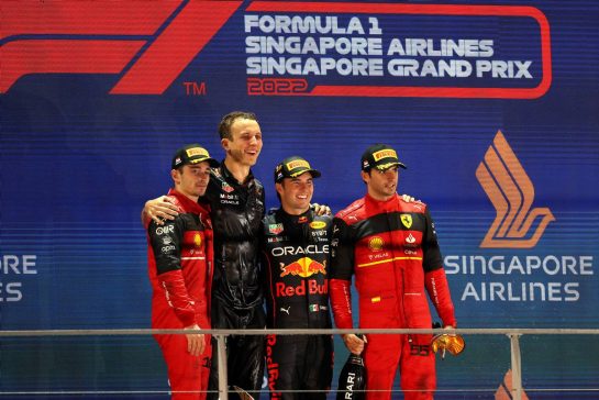 The podium (L to R): Charles Leclerc (MON) Ferrari, second; Hugh Bird (GBR) Red Bull Racing Engineer; Sergio Perez (MEX) Red Bull Racing, race winner; Carlos Sainz Jr (ESP) Ferrari, third.
02.10.2022. Formula 1 World Championship, Rd 17, Singapore Grand Prix, Marina Bay Street Circuit, Singapore, Race Day.
- www.xpbimages.com, EMail: requests@xpbimages.com &copy; Copyright: Moy / XPB Images