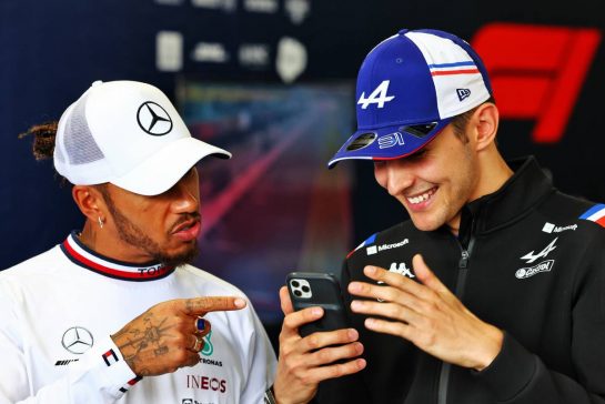 (L to R): Lewis Hamilton (GBR) Mercedes AMG F1 with Esteban Ocon (FRA) Alpine F1 Team.
06.10.2022. Formula 1 World Championship, Rd 18, Japanese Grand Prix, Suzuka, Japan, Preparation Day.
 - www.xpbimages.com, EMail: requests@xpbimages.com &copy; Copyright: Coates / XPB Images