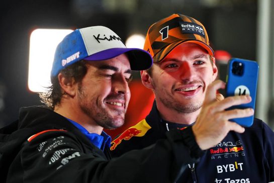 (L to R): Fernando Alonso (ESP) Alpine F1 Team with World Champion Max Verstappen (NLD) Red Bull Racing.
09.10.2022. Formula 1 World Championship, Rd 18, Japanese Grand Prix, Suzuka, Japan, Race Day.
- www.xpbimages.com, EMail: requests@xpbimages.com &copy; Copyright: Batchelor / XPB Images
