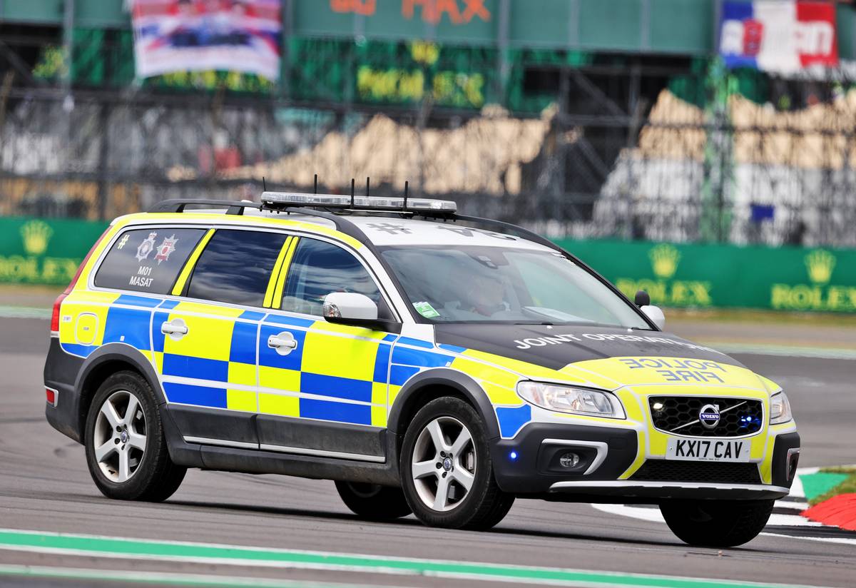 Police on the circuit at the start of the race as an incident involving people attempting to enter the circuit.
03.07.2022. Formula 1 World Championship, Rd 10, British Grand Prix, Silverstone, England, Race Day.
- www.xpbimages.com, EMail: requests@xpbimages.com &copy; Copyright: Moy / XPB Images