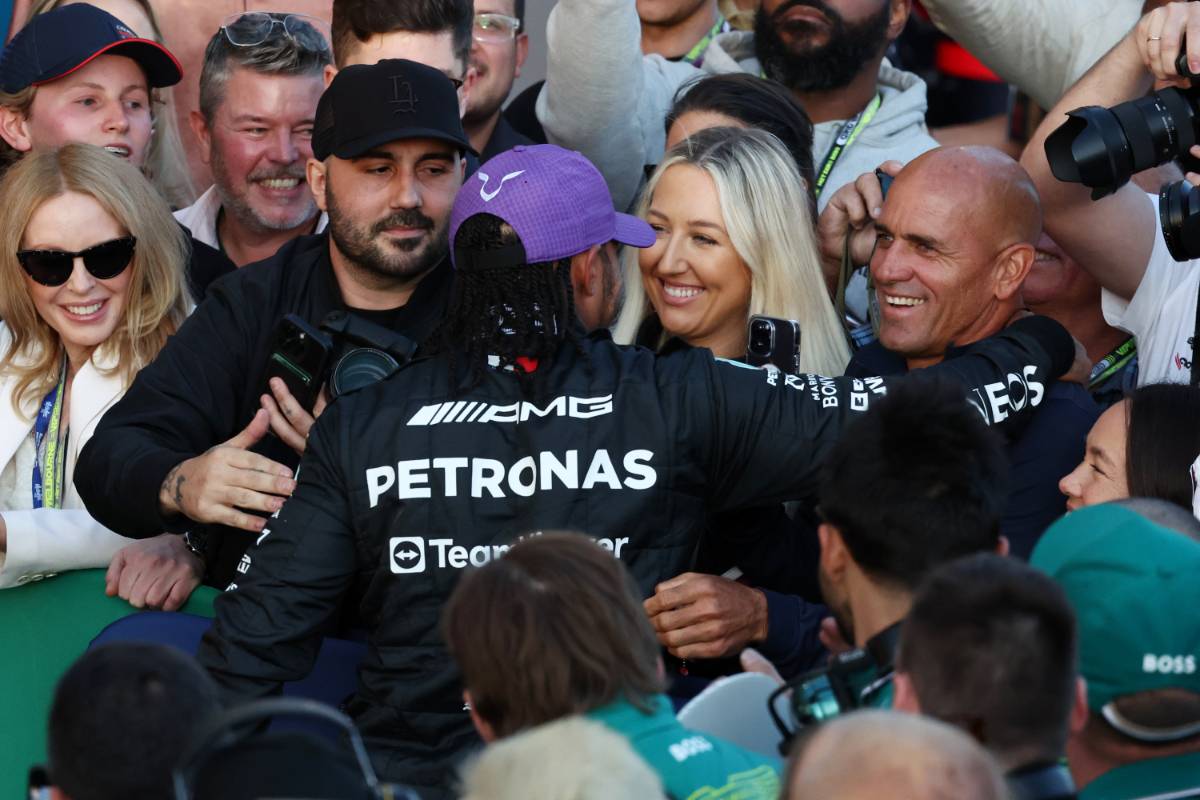 Lewis Hamilton (GBR) Mercedes AMG F1 celebrates his second position in parc ferme with Kylie Minogue (AUS) Singer and Kelly Slater (USA) Surfer. 02.04.2023. Formula 1 World Championship, Rd 3, Australian Grand Prix, Albert Park, Melbourne, Australia, Race Day. - www.xpbimages.com, EMail: requests@xpbimages.com © Copyright: Moy / XPB Images