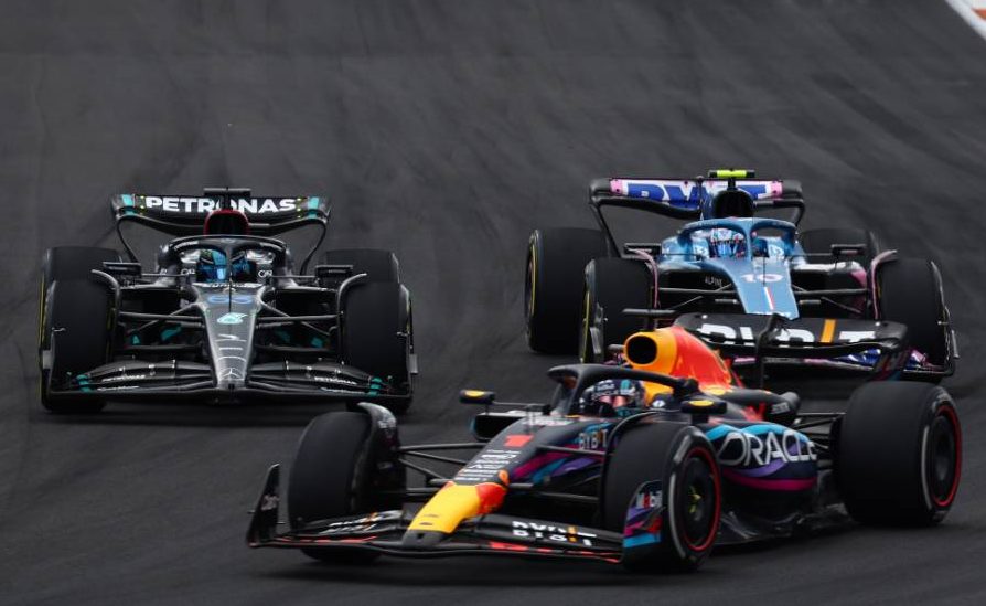 Max Verstappen (NLD) Red Bull Racing RB19 leads a battling George Russell (GBR) Mercedes AMG F1 W14 and Pierre Gasly (FRA) Alpine F1 Team A523. 07.05.2023. Formula 1 World Championship, Rd 5, Miami Grand Prix, Miami, Florida, USA, Race Day. - www.xpbimages.com, EMail: requests@xpbimages.com &copy; Copyright: Batchelor / XPB Images