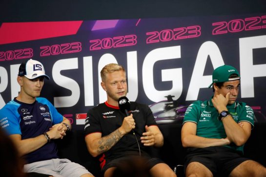 (L to R): Logan Sargeant (USA) Williams Racing; Kevin Magnussen (DEN) Haas F1 Team; and Lance Stroll (CDN) Aston Martin F1 Team, in the FIA Press Conference.
14.09.2023. Formula 1 World Championship, Rd 16, Singapore Grand Prix, Marina Bay Street Circuit, Singapore, Preparation Day.
- www.xpbimages.com, EMail: requests@xpbimages.com &copy; Copyright: XPB Images