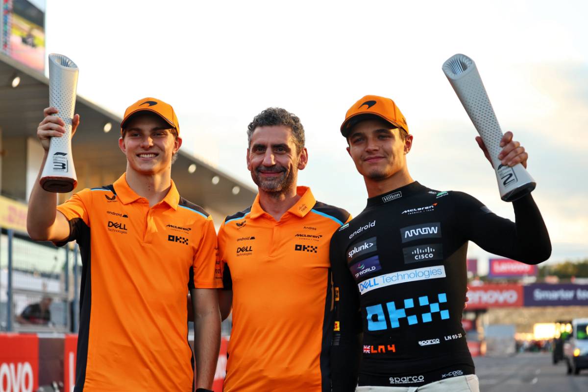 (L to R): Oscar Piastri (AUS) McLaren celebrates his third position with Andrea Stella (ITA) McLaren Team Principal and second placed team mate Lando Norris (GBR) McLaren. 24.09.2023. Formula 1 World Championship, Rd 17, Japanese Grand Prix, Suzuka, Japan, Race Day. - www.xpbimages.com, EMail: requests@xpbimages.com &copy; Copyright: Batchelor / XPB Images