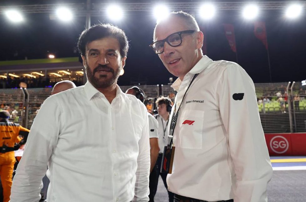 (L to R): Mohammed Bin Sulayem (UAE) FIA President with Stefano Domenicali (ITA) Formula One President and CEO on the grid. 17.09.2023. Formula 1 World Championship, Rd 16, Singapore Grand Prix, Marina Bay Street Circuit, Singapore, Race Day. - www.xpbimages.com, EMail: requests@xpbimages.com &copy; Copyright: Moy / XPB Images