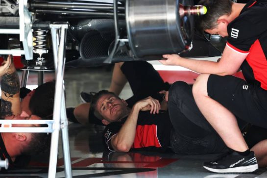 Nico Hulkenberg (GER) Haas F1 Team with mechanics underneath the Haas VF-24.
18.04.2024. Formula 1 World Championship, Rd 5, Chinese Grand Prix, Shanghai, China, Preparation Day.
 - www.xpbimages.com, EMail: requests@xpbimages.com &copy; Copyright: Coates / XPB Images