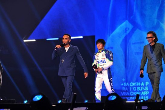 (L to R): Munya Chawawa (GBR) Actor with Yuki Tsunoda (JPN) Racing Bulls and Lawrence Barretto (GBR) Formula 1 Senior Writer Editor.
18.02.2025. Formula One World Championship, F1 75 Live. O2 Arena, London, England.
- www.xpbimages.com, EMail: requests@xpbimages.com &copy; Copyright: Batchelor / XPB Images