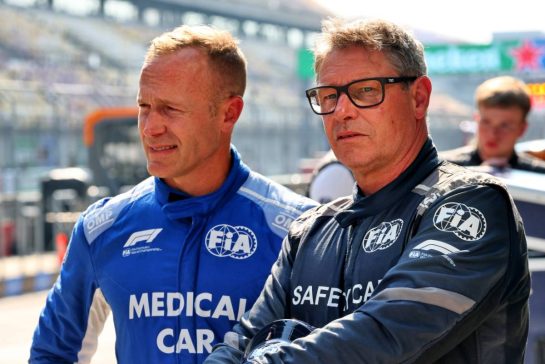 (L to R): Karl Reindler (AUS) FIA Medical Car Driver with Bernd Maylander (GER) FIA Safety Car Driver.
20.03.2025. Formula 1 World Championship, Rd 2, Chinese Grand Prix, Shanghai, China, Preparation Day.
- www.xpbimages.com, EMail: requests@xpbimages.com © Copyright: Batchelor / XPB Images