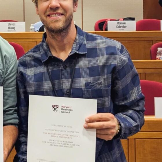 Vettel shifts gears, completes Harvard Business School program