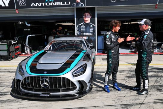 (L to R): Andrea Kimi Antonelli (ITA) Mercedes AMG F1 and Valtteri Bottas (FIN) Mercedes AMG F1 Reserve Driver with a Mercedes-AMG GT2 W16.
04.09.2025. Formula 1 World Championship, Rd 16, Italian Grand Prix, Monza, Italy, Preparation Day.
- www.xpbimages.com, EMail: requests@xpbimages.com &copy; Copyright: Batchelor / XPB Images