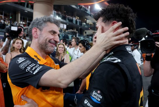 ABU DHABI, UNITED ARAB EMIRATES - DECEMBER 07: 2025 F1 World Drivers Champion and Third placed celebrates with Andrea Stella, Team Principal of McLaren in parc ferme during the F1 Grand Prix of Abu Dhabi at Yas Marina Circuit on December 07, 2025 in Abu Dhabi, United Arab Emirates. (Photo by Steven Tee/LAT Images)