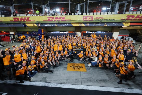 ABU DHABI, UNITED ARAB EMIRATES - DECEMBER 07: 2025 F1 World Drivers Champion Lando Norris of Great Britain and McLaren celebrates with his team during the F1 Grand Prix of Abu Dhabi at Yas Marina Circuit on December 07, 2025 in Abu Dhabi, United Arab Emirates. (Photo by Steven Tee/LAT Images)