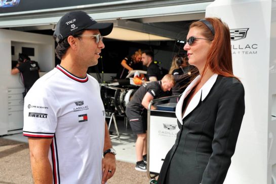 (L to R): Sergio Perez (MEX) Cadillac Formula 1 Team with Cassidy Towriss (USA).
04.06.2026. Formula 1 World Championship, Rd 6, Monaco Grand Prix, Monte Carlo, Monaco, Preparation Day.
- www.xpbimages.com, EMail: requests@xpbimages.com © Copyright: Batchelor / XPB Images