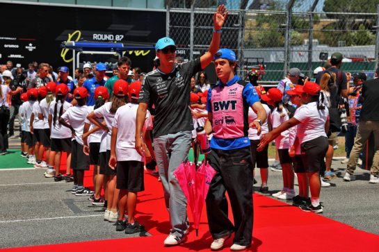 (L to R): George Russell (GBR) Mercedes AMG Formula One Team and Franco Colapinto (ARG) Alpine F1 Team on the drivers' parade.
14.06.2026. Formula 1 World Championship, Rd 7, Barcelona-Catalunya Grand Prix, Barcelona, Spain, Race Day.
 - www.xpbimages.com, EMail: requests@xpbimages.com &copy; Copyright: Patching / XPB Images