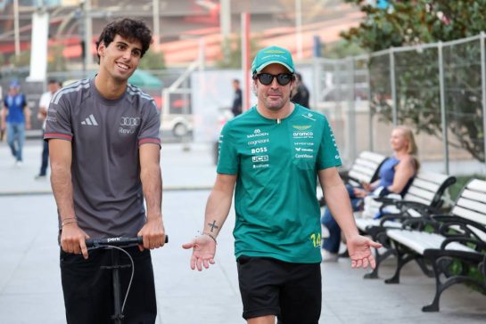 (L to R): Gabriel Bortoleto (BRA) Audi F1 Team with Fernando Alonso (ESP) Aston Martin F1 Team.
24.09.2026. Formula One World Championship, Rd 15, Azerbaijan Grand Prix, Baku, Azerbaijan, Practice Day.
- www.xpbimages.com, EMail: requests@xpbimages.com &copy; Copyright: Batchelor / XPB Images