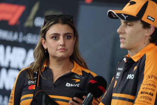 Sophie Almeida McLaren Communications with Oscar Piastri (AUS) McLaren.
01.10.2026. Formula 1 World Championship, Rd 16, Bahrain Grand Prix, Sepang, Malaysia, Preparations Day. 
- www.xpbimages.com, EMail: requests@xpbimages.com &copy; Copyright: Moy / XPB Images
